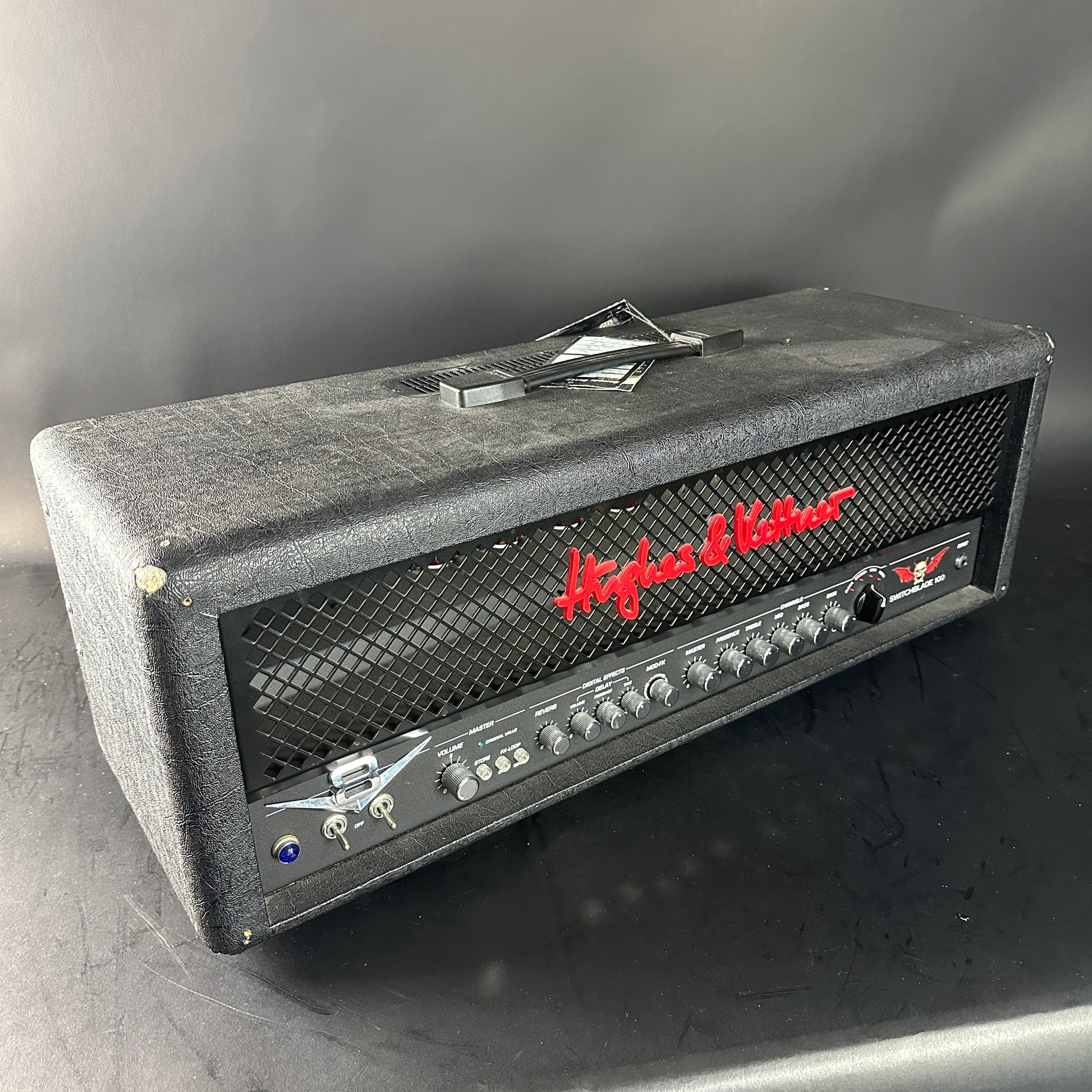 Hughes & Kettner guitar amplifier head on a gray background