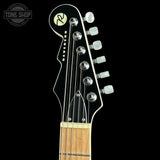 Guitar headstock with brand logo on a black background