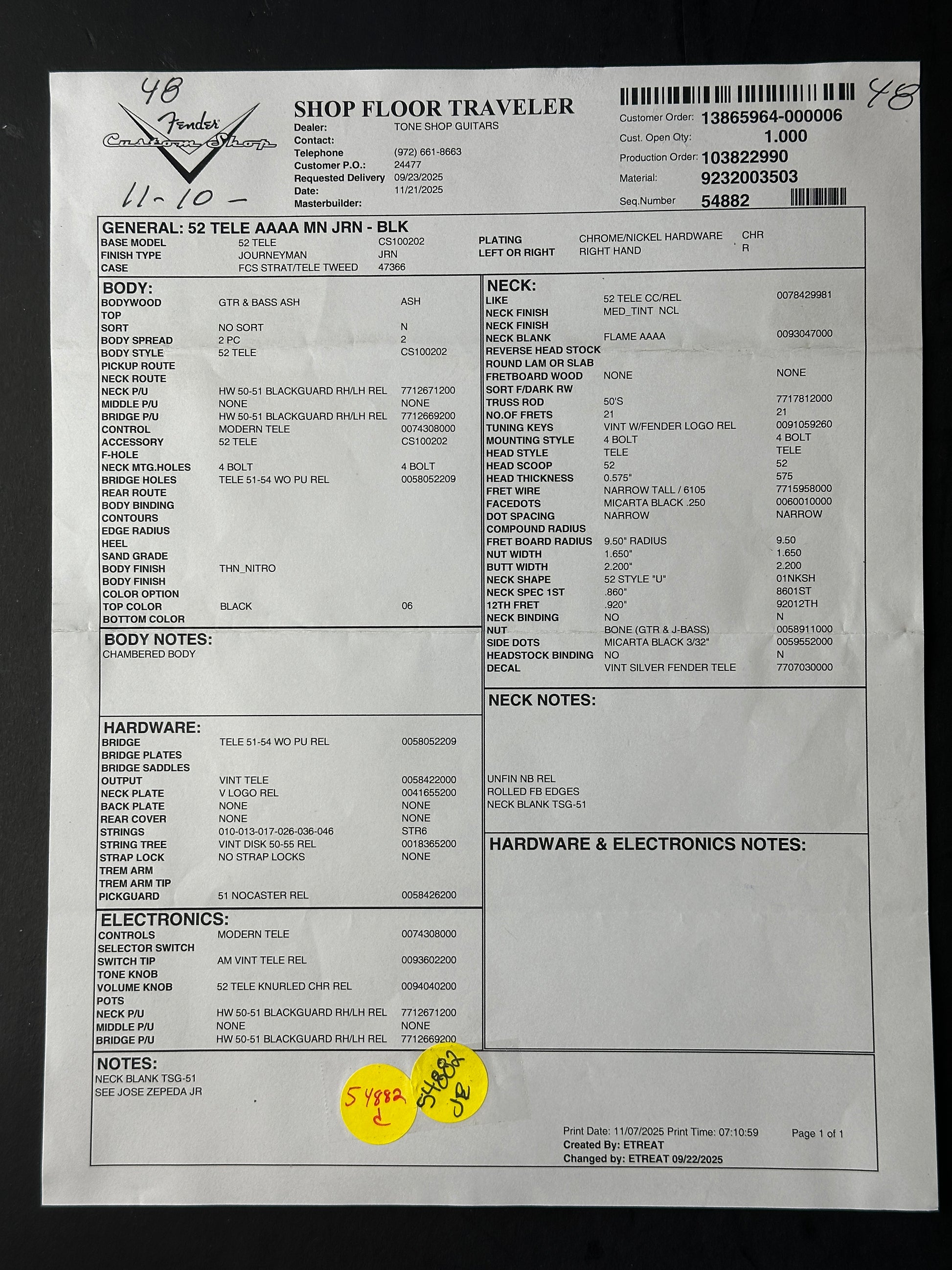 Document with text and a yellow label on a black background