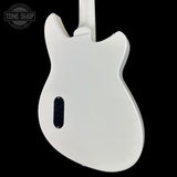 White electric guitar body on a black background with 'Tone Shop' logo.