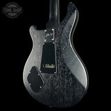 The back of a Deerranger electric guitar with a textured black and gray wood finish, featuring a black pickguard and a silver Deerranger logo badge, shown against a solid black background.