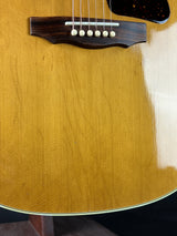 Close-up of a wooden acoustic guitar's body