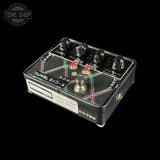 Guitar effects pedal with 'Dumbloid-X' branding on a black background