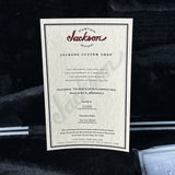 Jackson guitar certificate on a dark textured background