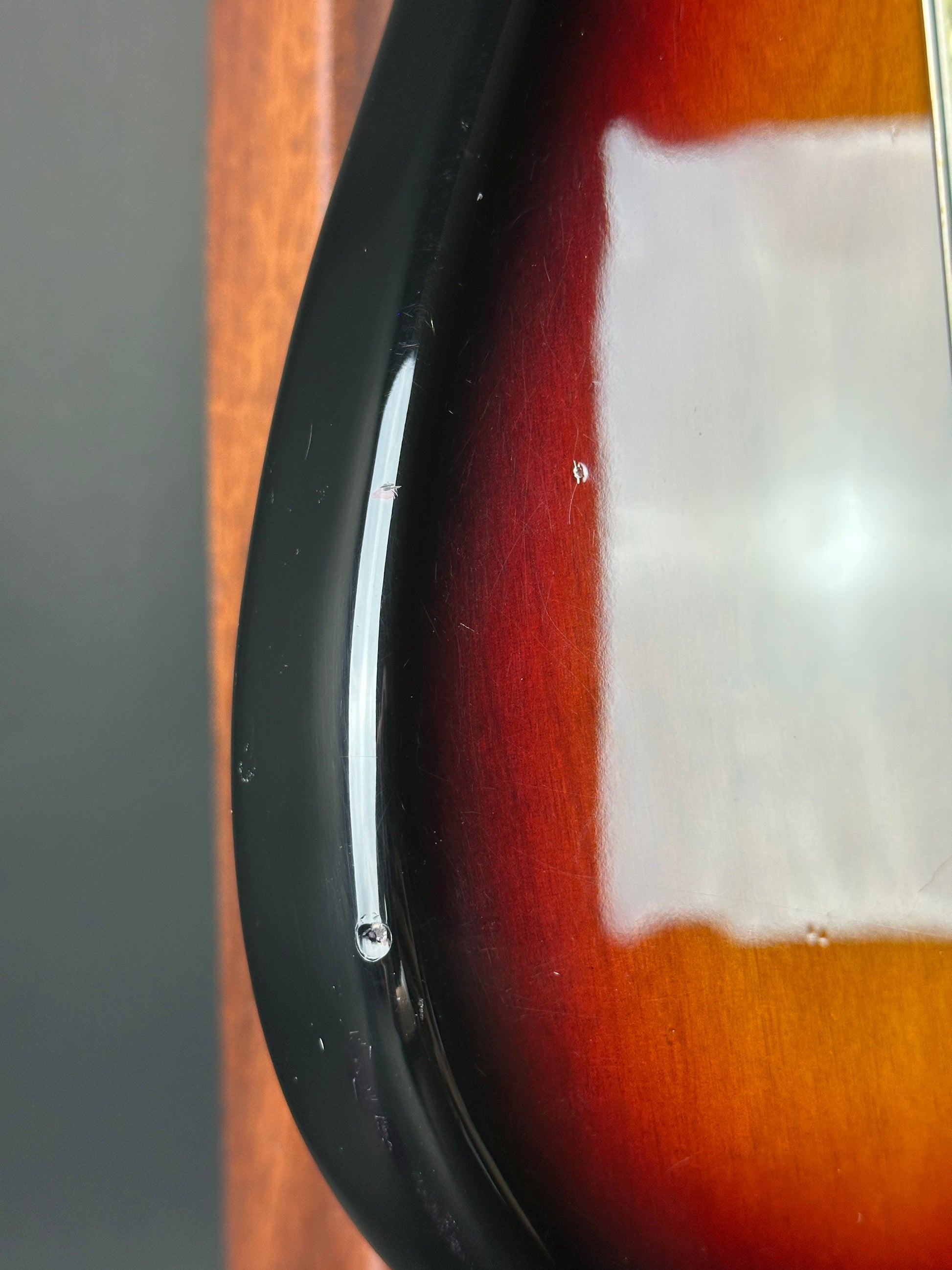 Wear on bottom edge of Used Fender Bonnie Raitt Stratocaster.