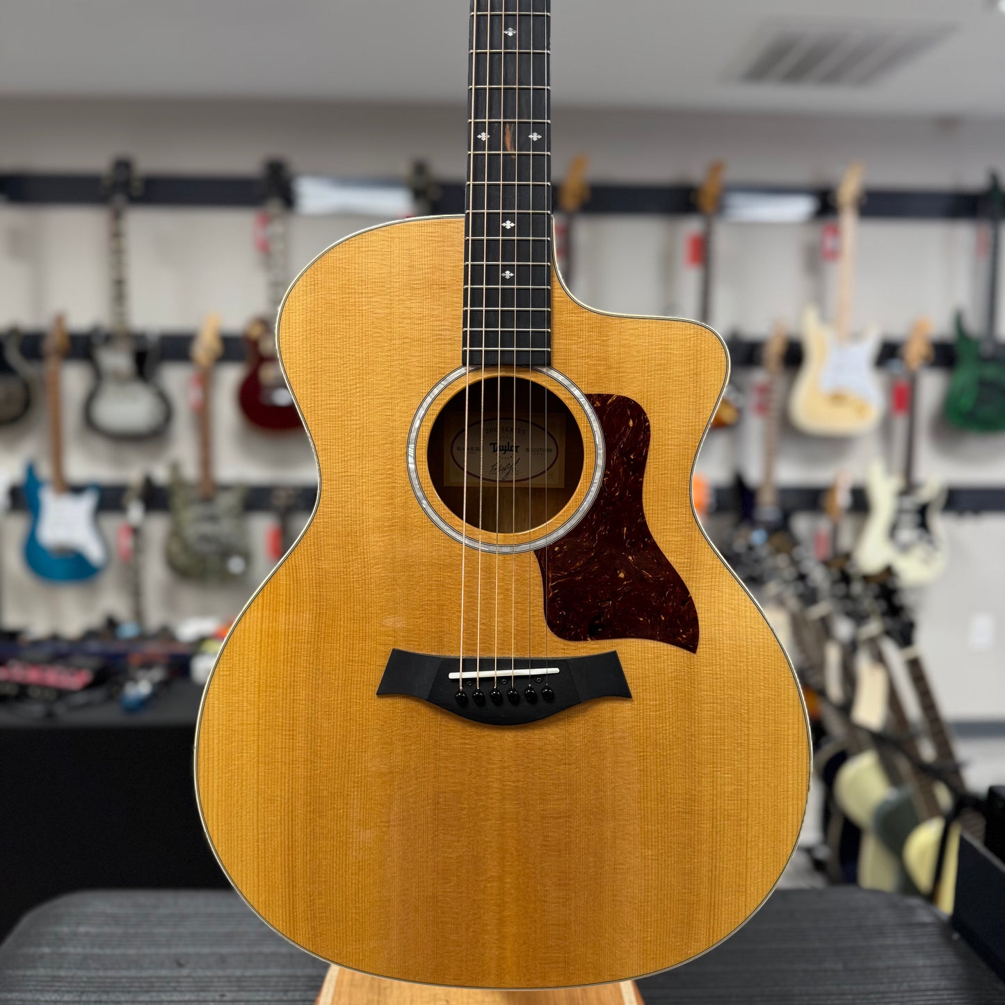 Front of Used taylor 214ce-K DLX Natural w/case TSS6315