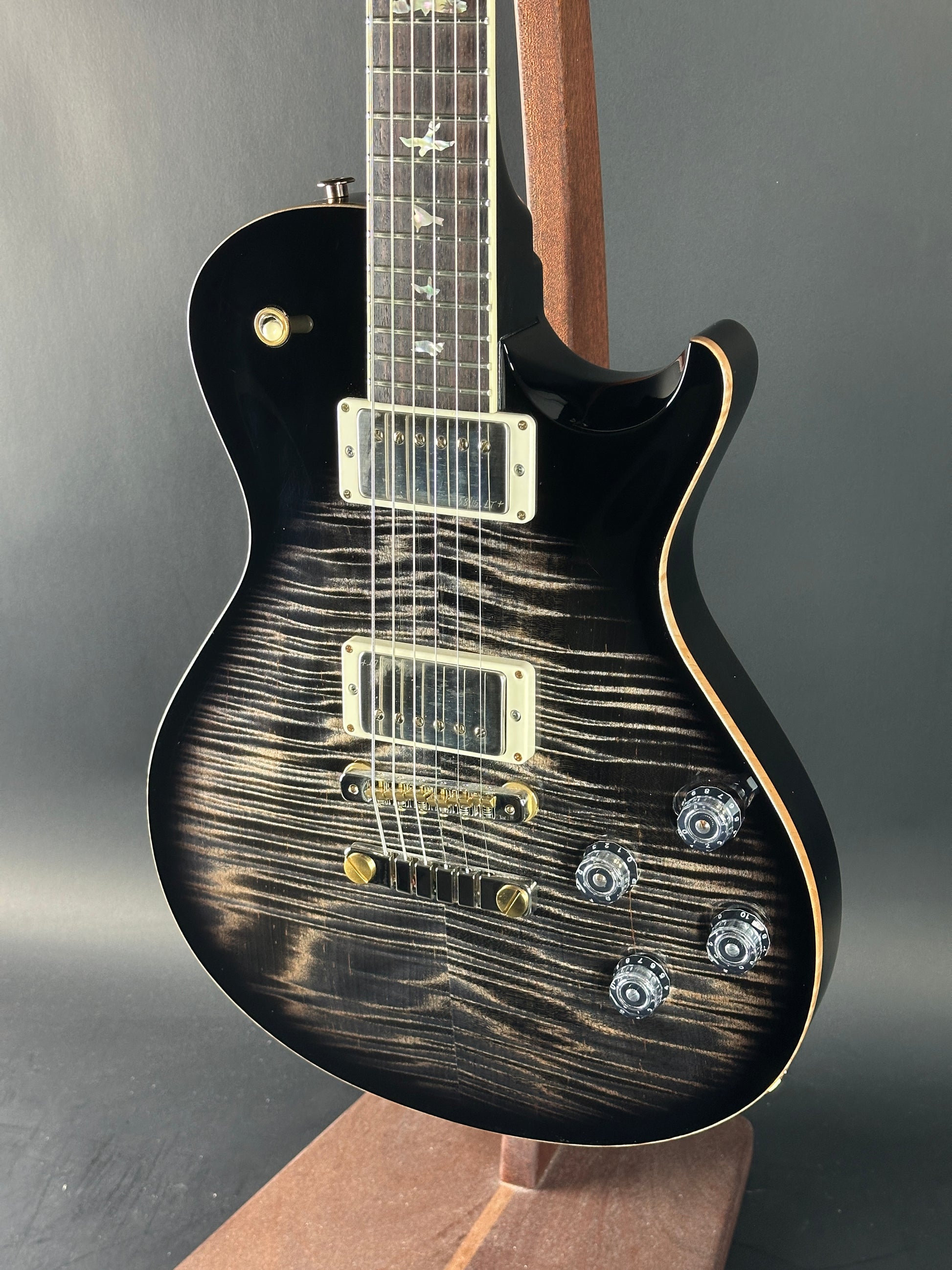Front angle of Used PRS McCarty 594 Singlecut 10-Top Charcoal Burst.