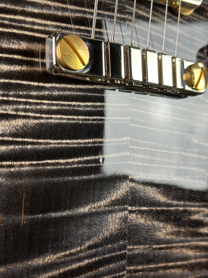 Ding below bridge of Used PRS McCarty 594 Singlecut 10-Top Charcoal Burst.