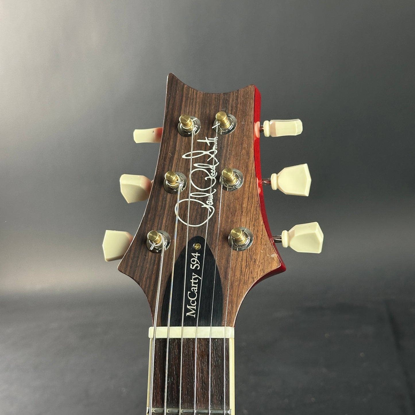 Headstock of Used PRS McCarty 594 Singlecut 10-Top McCarty Sunburst.