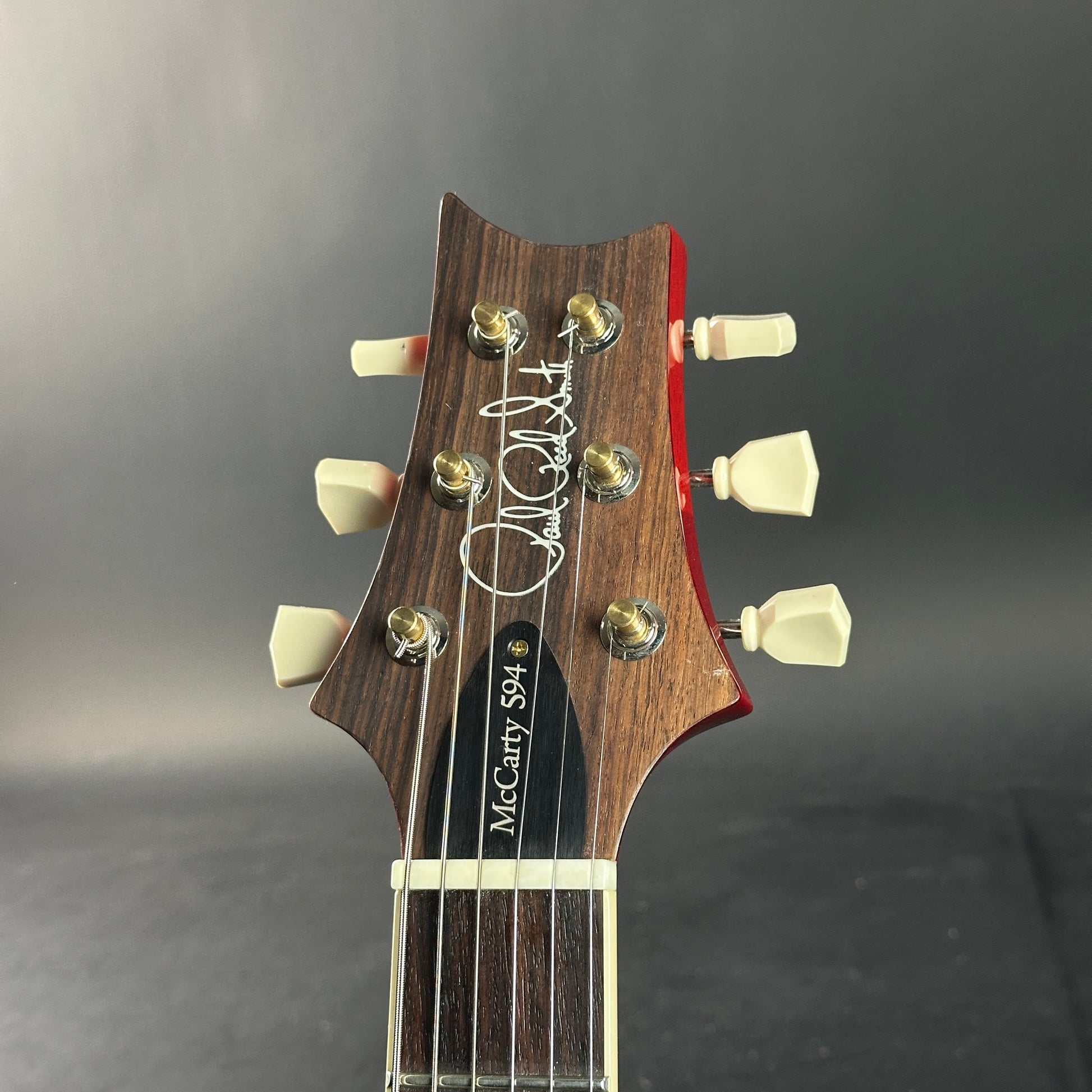 Headstock of Used PRS McCarty 594 Singlecut 10-Top McCarty Sunburst.
