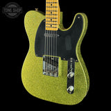 Front angle of Fender Custom Shop TSG Exclusive ’52 Telecaster Chambered Chartreuse Sparkle Journeyman Relic.