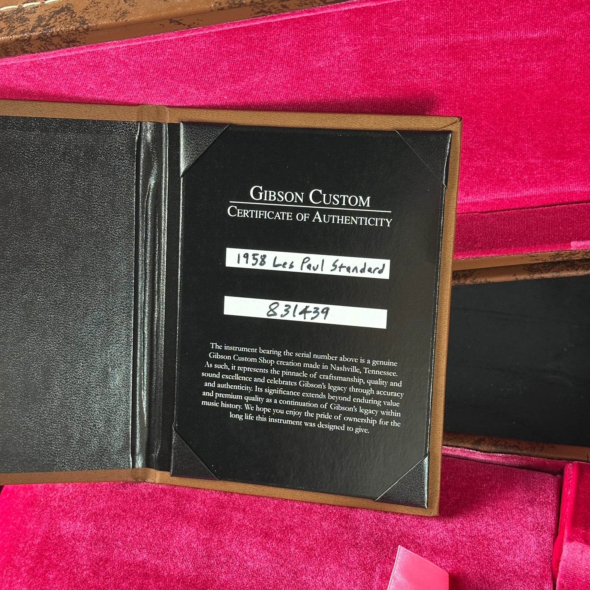 Gibson Custom Certificate of Authenticity on a pink velvet background