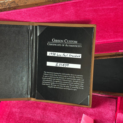 Gibson Custom Certificate of Authenticity on a pink velvet background