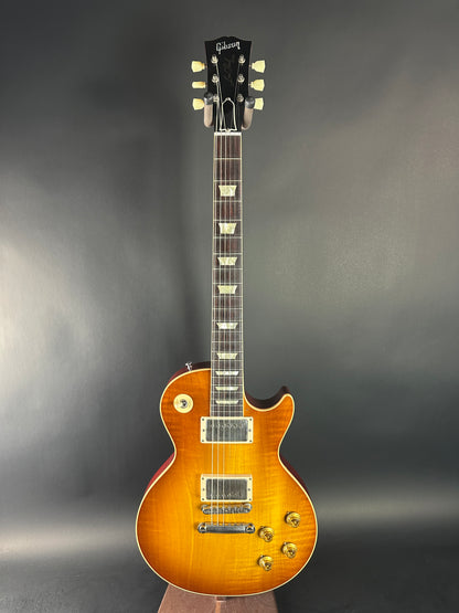 Electric guitar with a sunburst finish on a dark gray background