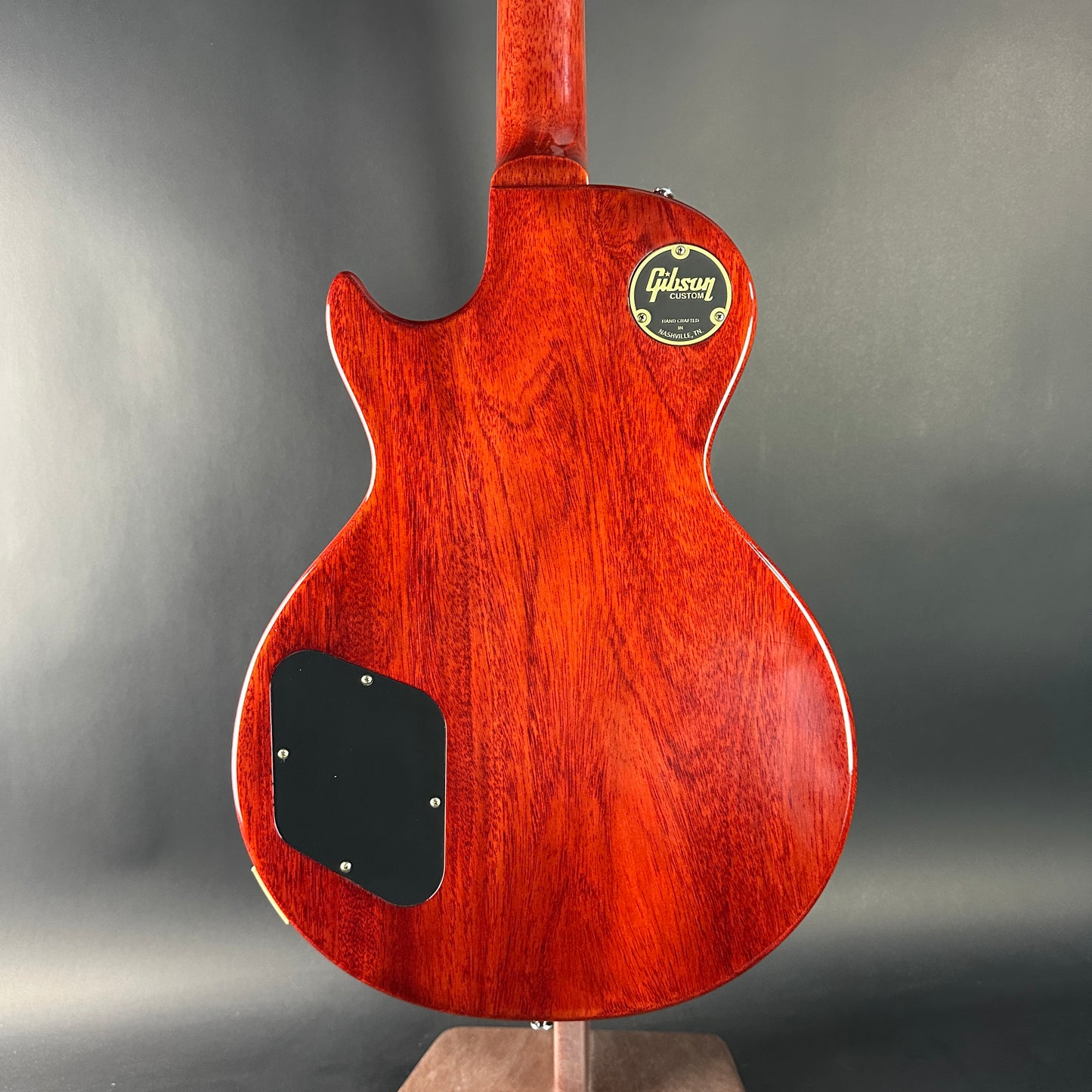 Gibson electric guitar body on a gray background