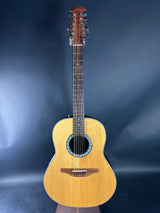 Acoustic guitar with 12 strings on a dark blue background