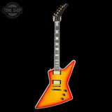 A TONE SHOP electric guitar with a classic sunburst finish, featuring a bright orange and yellow center fading to black at the edges, set against a solid black background.