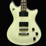 White electric guitar on a light gray background