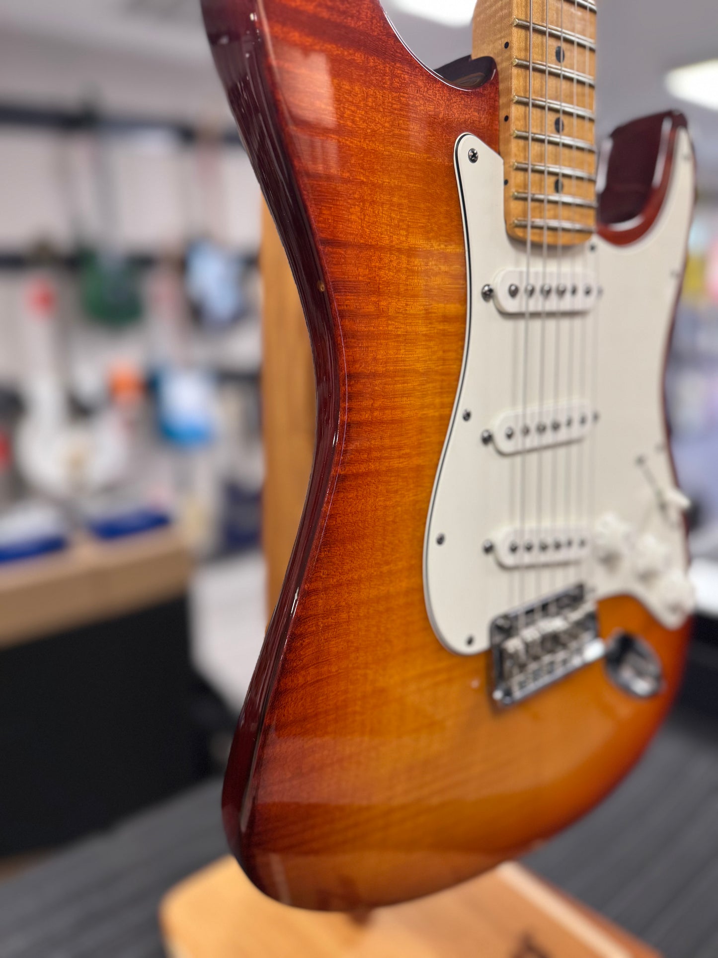 Left side of body of Used 2012 Fender Select Stratocaster Dark Cherry Burst w/case TSS6295
