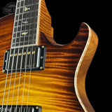 Front detail of PRS Private Stock 11863 McCarty Singlecut 594 Semi-hollow Curly Maple McCarty Glow.