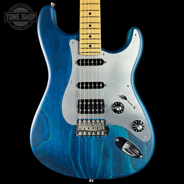 Blue electric guitar with a black background
