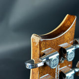 Chip on headstock of Used PRS A60E Angelus Blue.