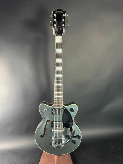 Electric guitar with a metallic finish on a gray background