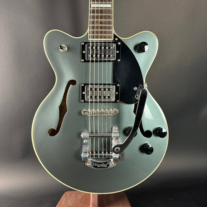 Electric guitar with a metallic finish on a dark background