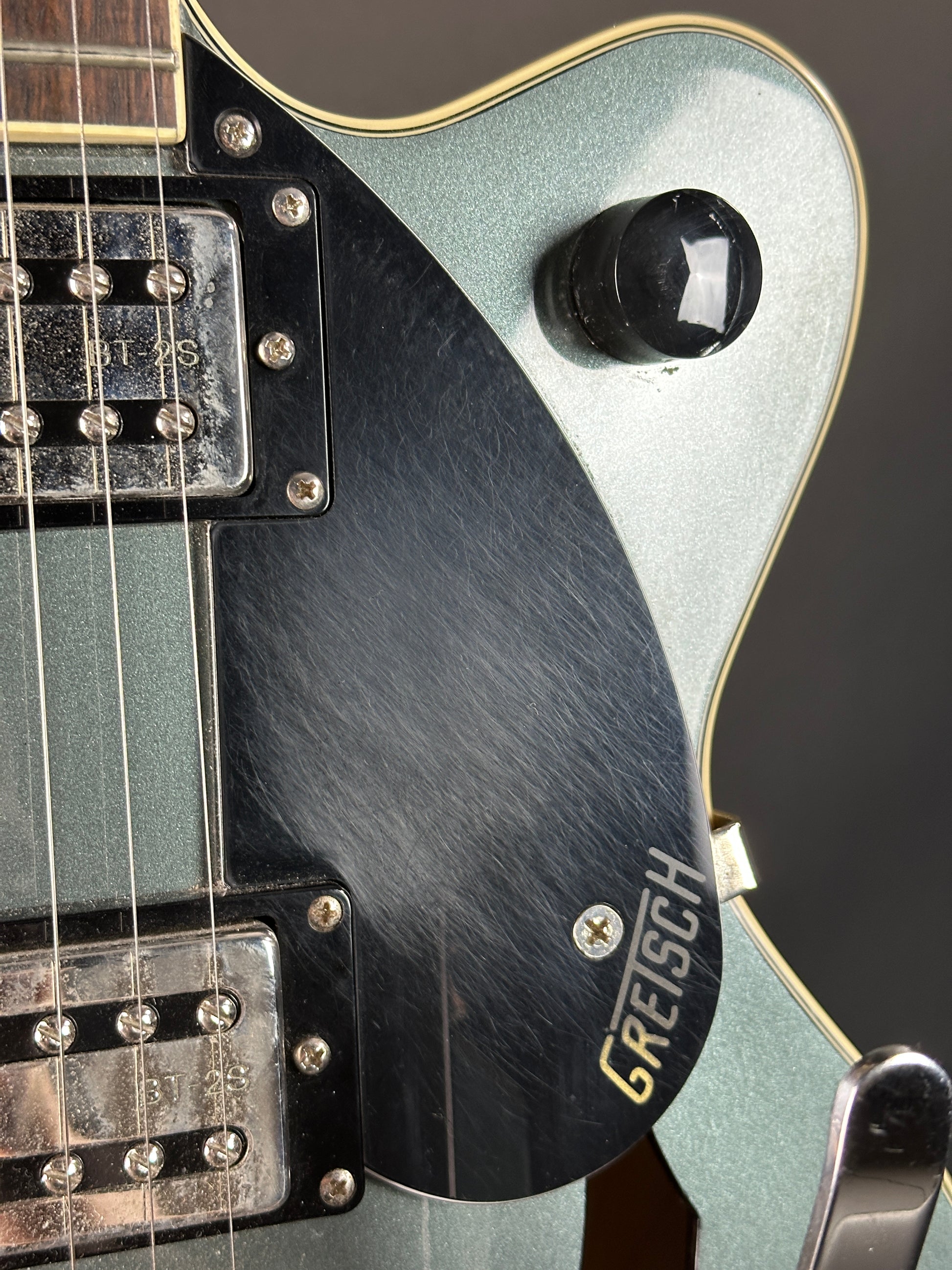 Scratches on pickguard of Used Gretsch G2655T Streamliner Stirling Green.