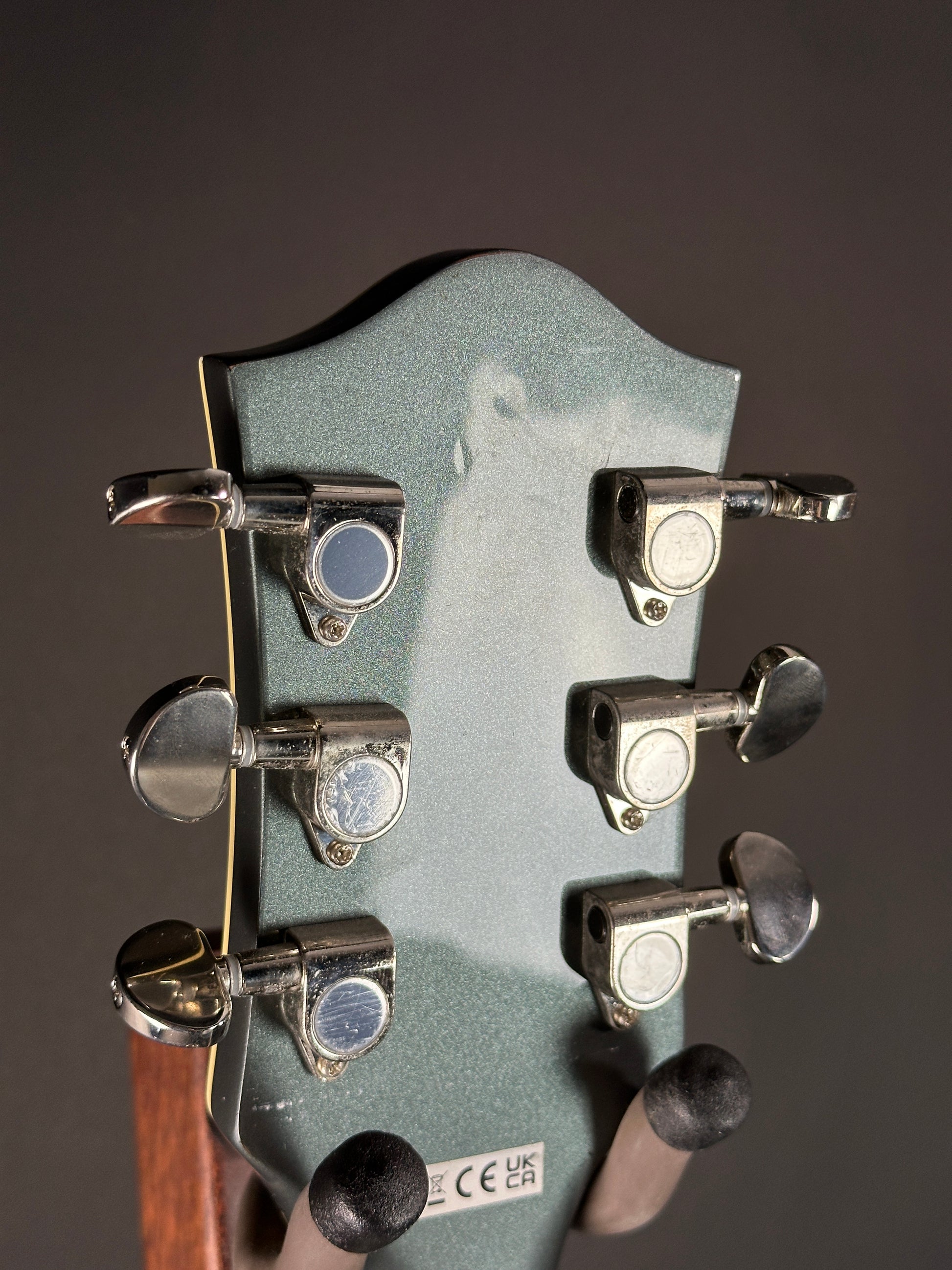 Wear on back of headstock of Used Gretsch G2655T Streamliner Stirling Green.