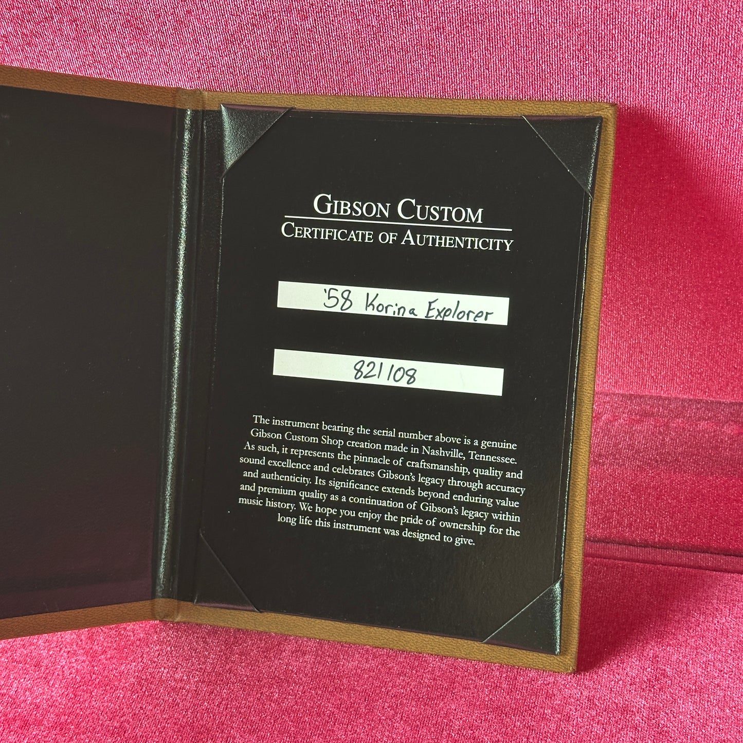 Gibson Custom Certificate of Authenticity on a pink background