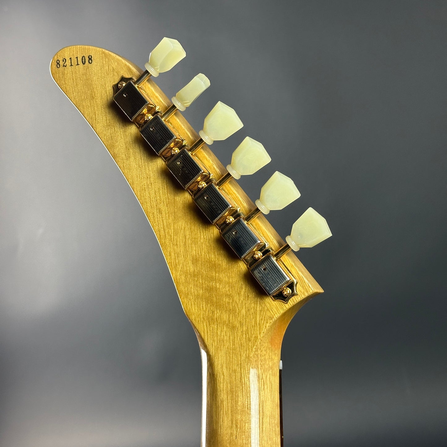 Back of headstock of Used 2022 Gibson Custom Shop 1958 Explorer Reissue Korina Black Pickguard.