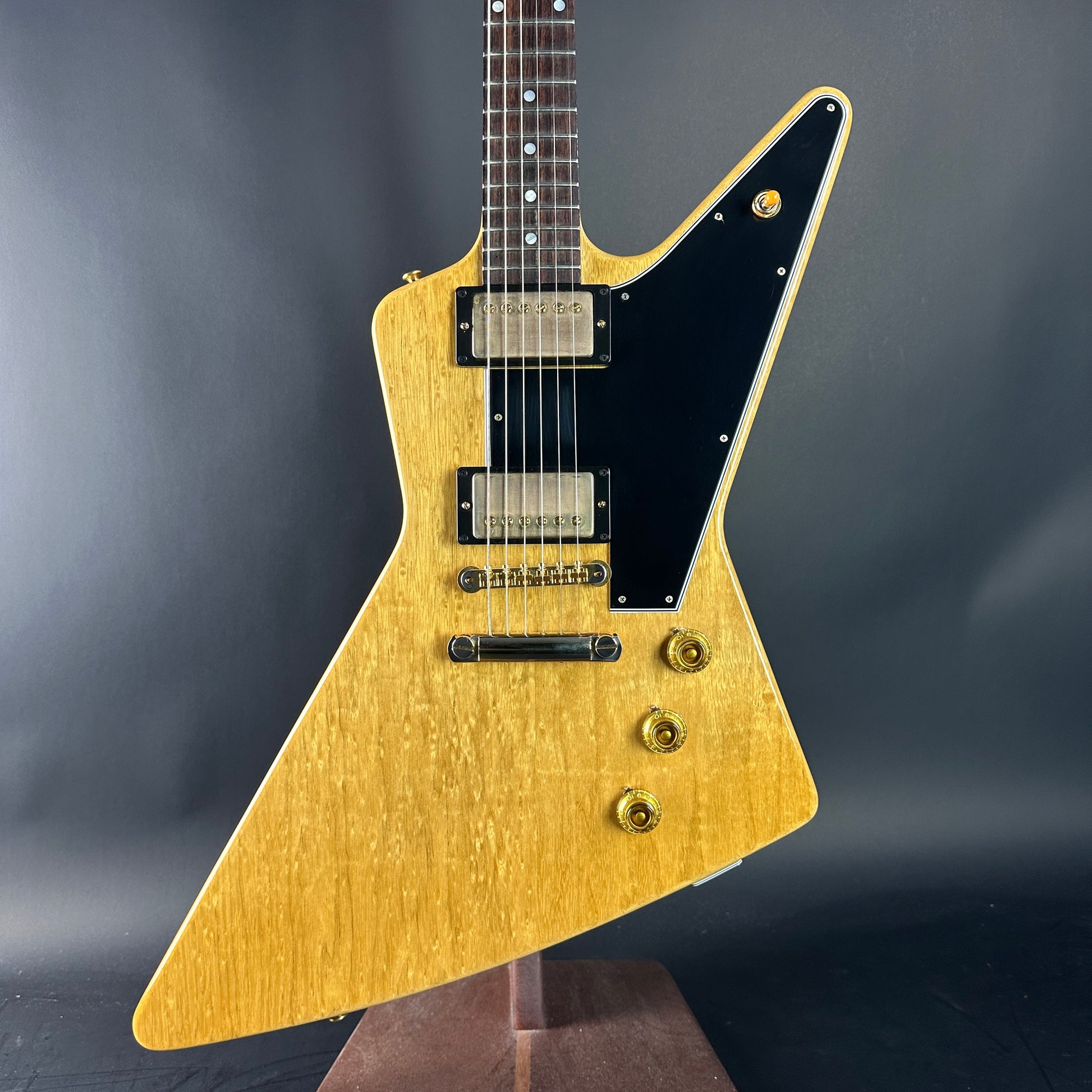 Front of Used 2022 Gibson Custom Shop 1958 Explorer Reissue Korina Black Pickguard.