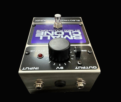 Electro-Harmonix Small Clone guitar effects pedal on a textured surface