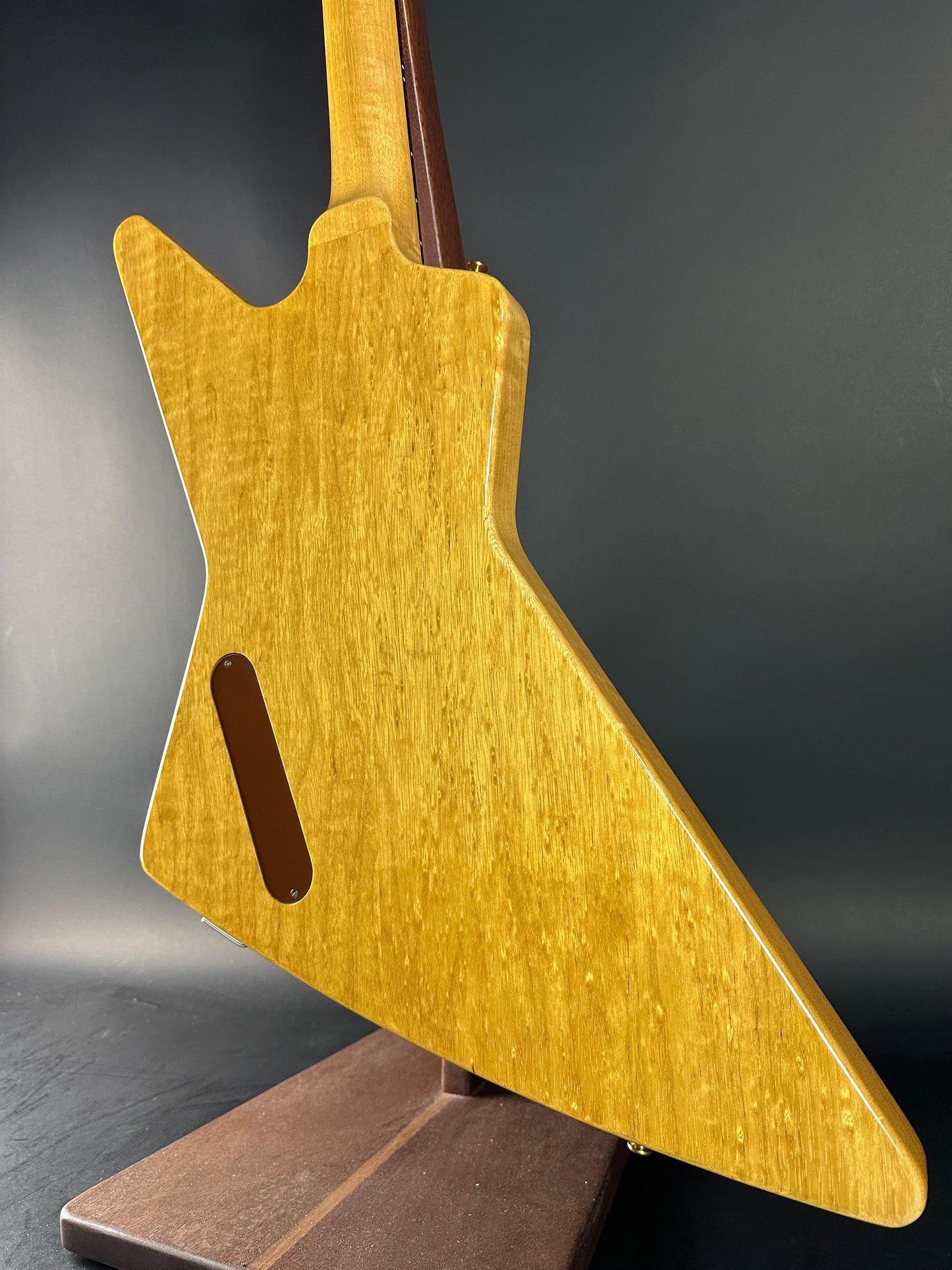 Back angle of Used 2022 Gibson Custom Shop 1958 Explorer Reissue Korina Black Pickguard.