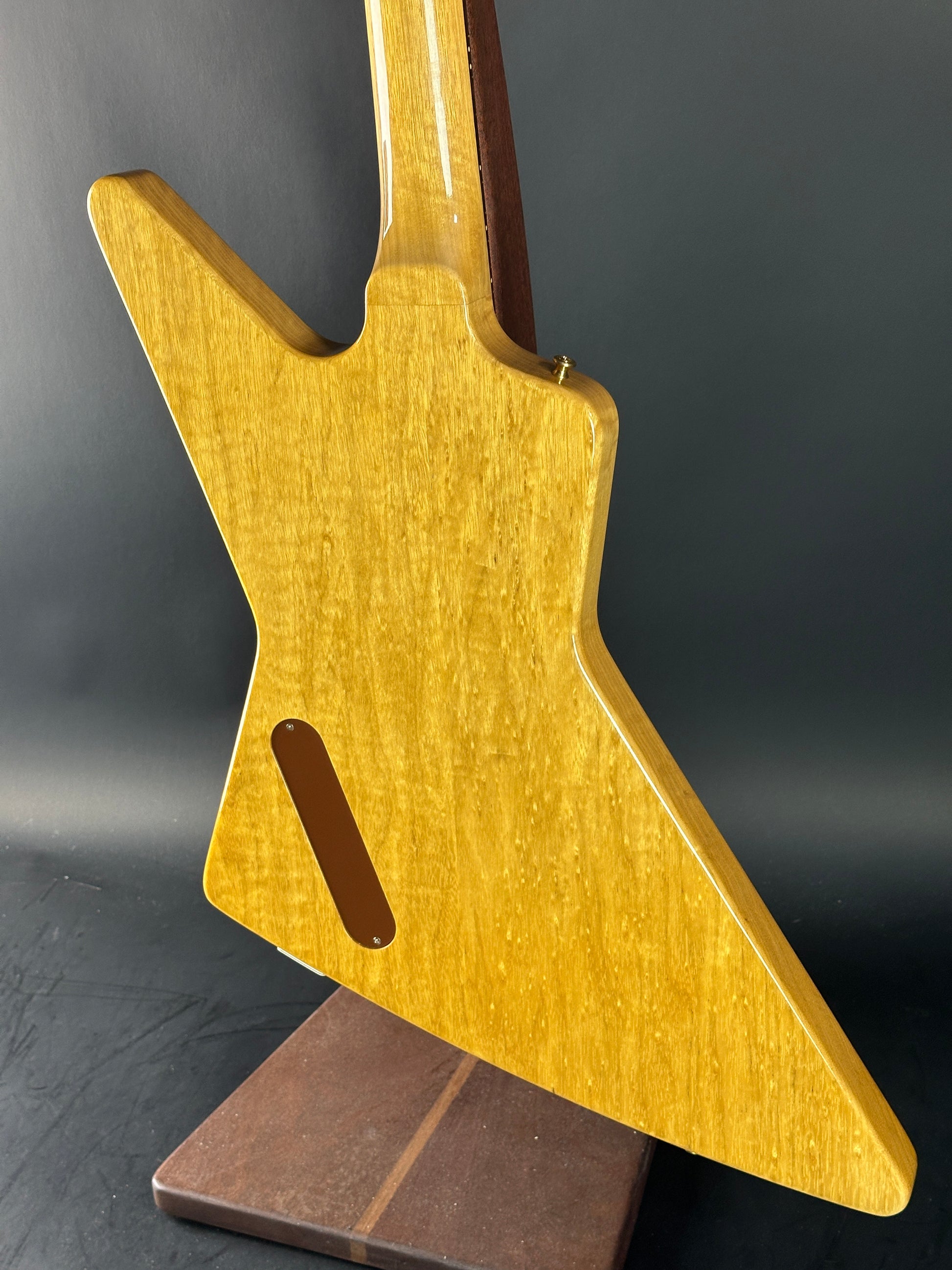 Back angle of Used 2022 Gibson Custom Shop 1958 Explorer Reissue Korina Black Pickguard.