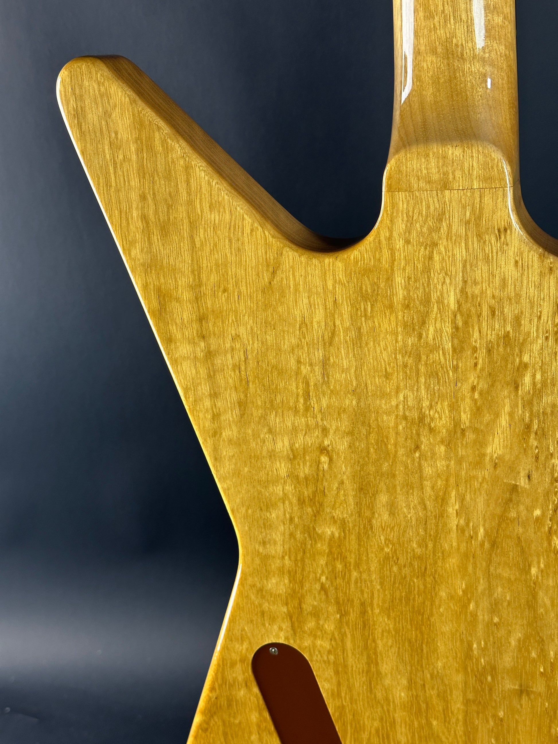 Back angle of Used 2022 Gibson Custom Shop 1958 Explorer Reissue Korina Black Pickguard.