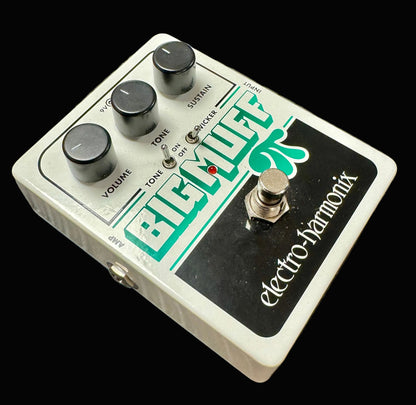 Electro-Harmonix Big Muff Pi guitar effects pedal on a textured surface