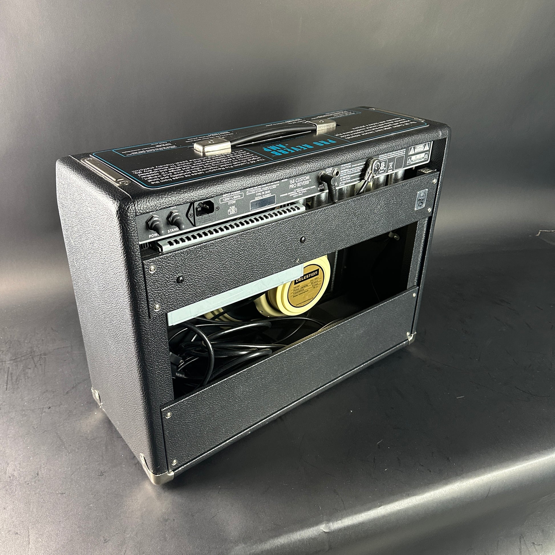 Vintage-style amplifier on a gray background