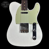A white Fender Telecaster electric guitar with a light sage green pickguard, shown against a solid black background. The brand logo 'Tone Shop' is visible as an overlay in the top-left corner.