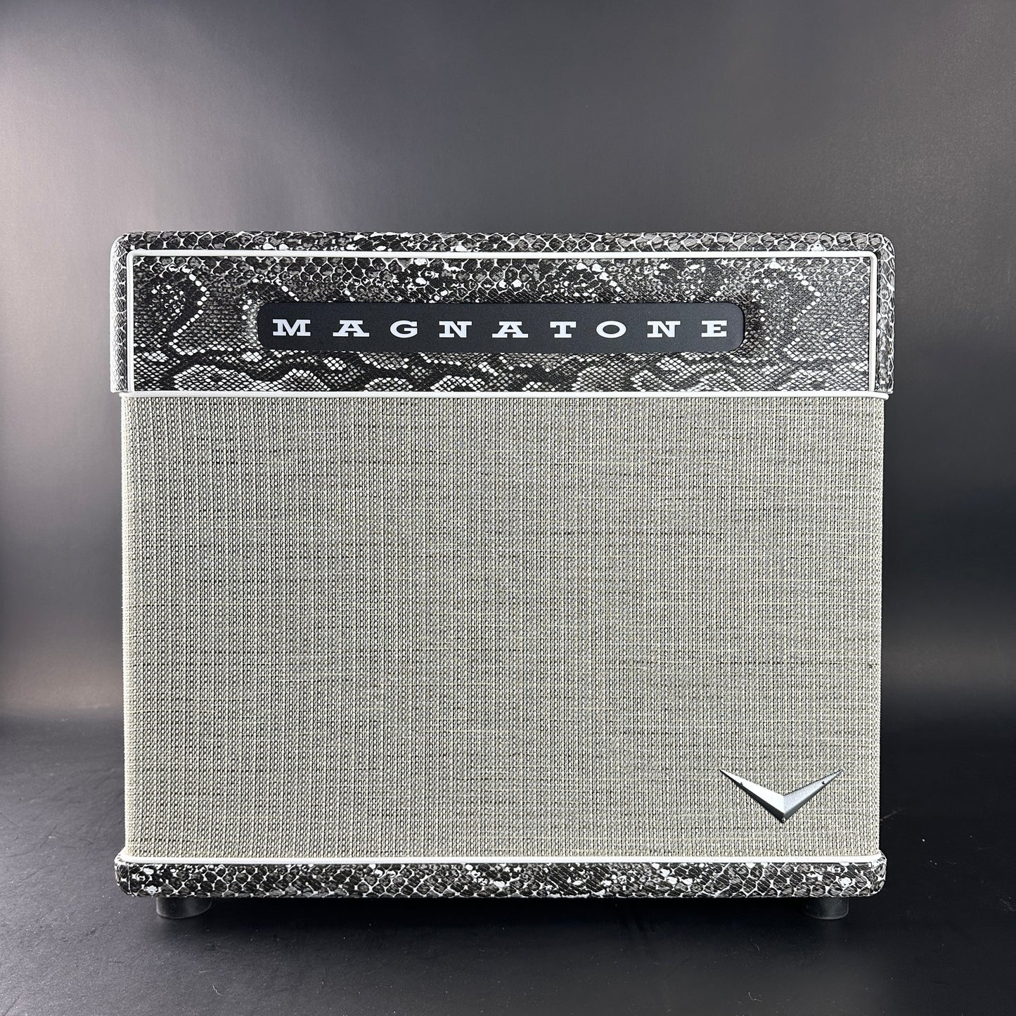 Guitar amplifier with 'Magnatone' branding on a gray background