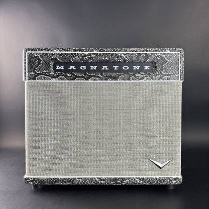 Guitar amplifier with 'Magnatone' branding on a gray background