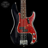 A four-string bass guitar with a glossy black body, a red and gold marbled pickguard, and chrome hardware, shown against a solid black background with a Tone Shop watermark in the top left corner.