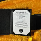 Gibson Custom Certificate of Authenticity on a guitar case with a textured background