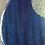 Scratch on back of Used 2005 Taylor T5-S Flame Blue.