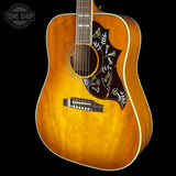 Front angle of Used 2025 Gibson Hummingbird Original Heritage Cherry Sunburst.