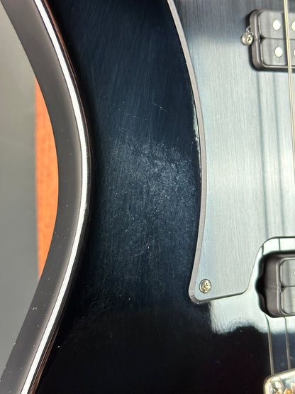 Close-up of a guitar's soundhole and body