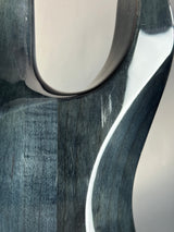 Close-up of a metallic object with a reflective surface