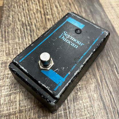 Side of Used 1980's Seymour Duncan 1 Button Footswitch for Convertible Amp TFW303