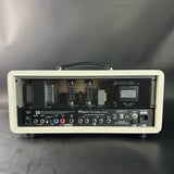 Guitar amplifier head with visible brand logo on a gray background